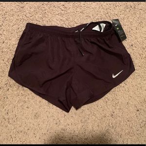 Burgundy Nike workout pants